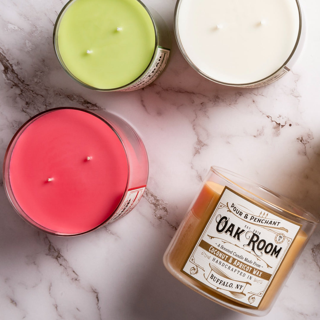 Pour & Penchant scented candles poured using luxury coconut and apricot wax. Candles shown are Oak Room, Pink Lady, and Tomato Patch